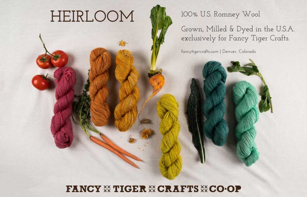 Fancy Tiger Crafts Pom Pom magazine ad featuring yarns in various colors next to a variety of vegetables.