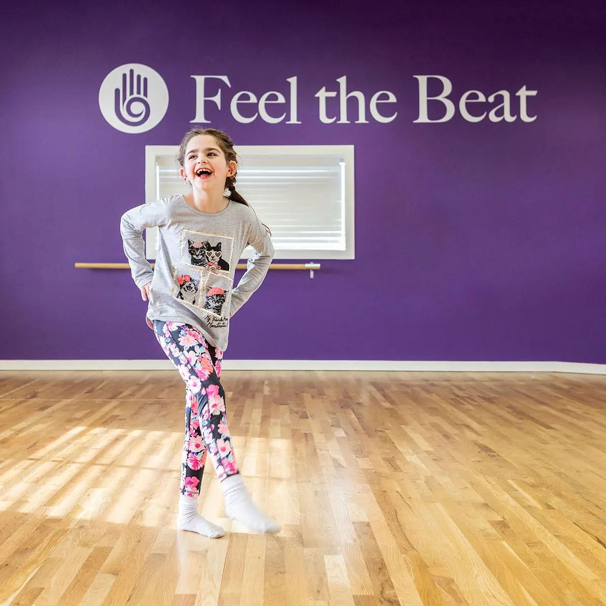 Dance studio branding shoot with Feel the Beat featuring dancers in the studio.