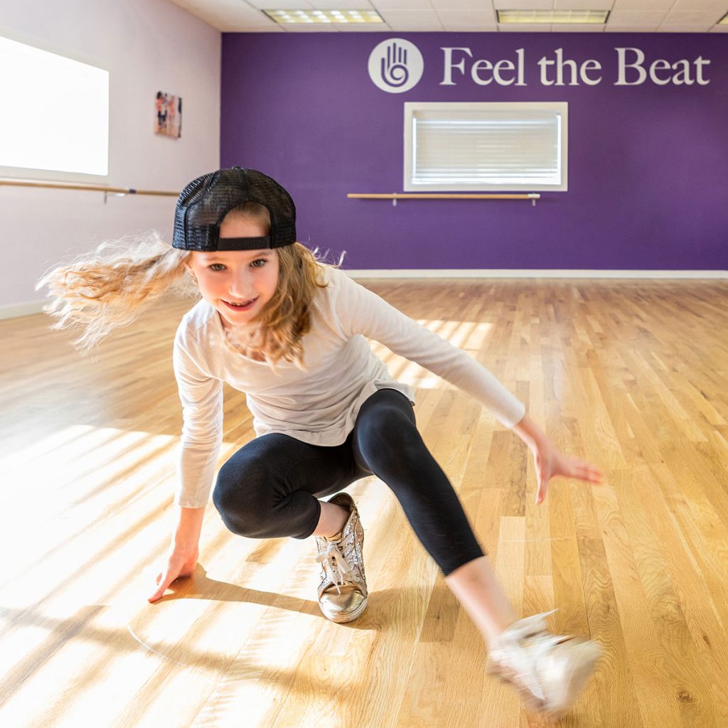 Dance studio branding shoot with Feel the Beat featuring dancers in the studio.