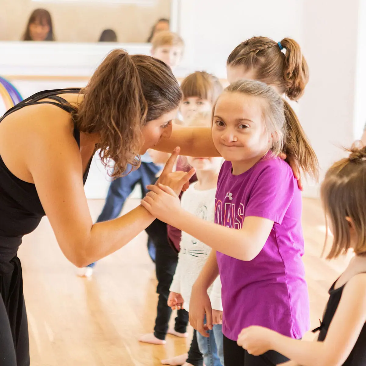 Feel the Beat studio branding shoot featuring dancers with disabilities in class with the owner.