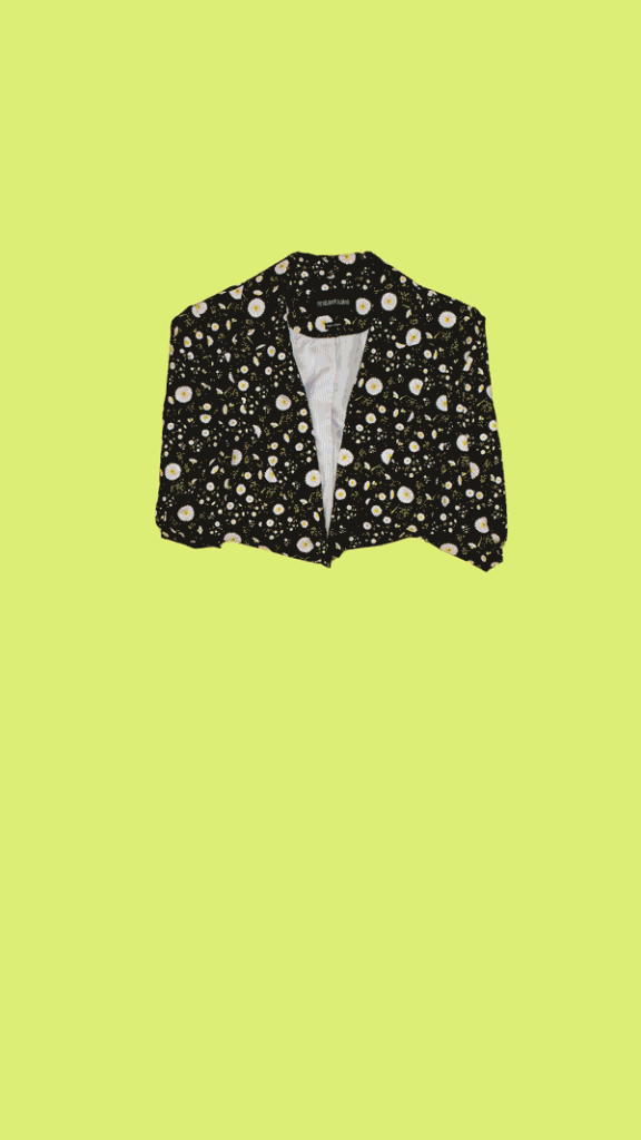 Stop motion gif of designer blazer unfolding and flowers dancing around it.
