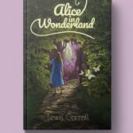 "Alice in Wonderland" book cover featuring a photo composite of a forest and gate opened by a girl in a blue dress to reveal a magical illustrated scene in purple.