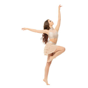 Lyrical dancer posed in passé elevé with "L" shaped arms, one reaching up and one reaching side.