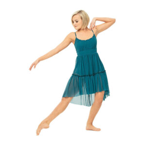 Lyrical dancer posed in a bent tendu with one arm pressed to shoulder and one reaching out.