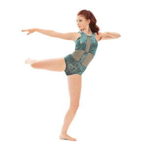 Lyrical dancer posed in back attitude with arms reaching to side, one bent and one outstretched.