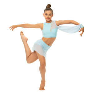 Lyrical dancer posed on forced arch leg front and back leg bent behind, arms reaching out to the sides.