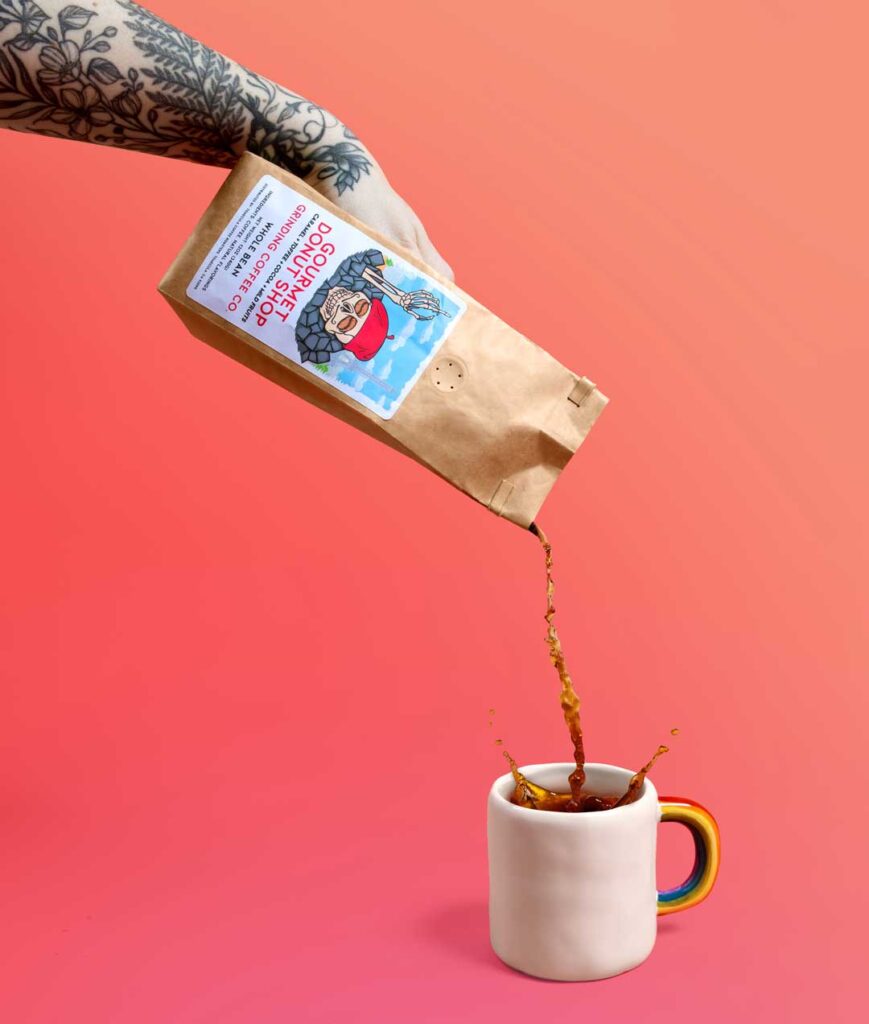Composite retouching of hand pouring liquid coffee out of coffee beans bag.