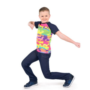 Hip hop dancer posed in a bent lunge with one arm held at chest and other down by side with fists.