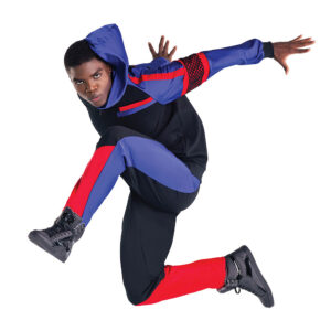 Hip hop dancer posed in a leap with knees bent and feet flexed, arms pressed behind them.