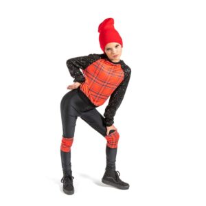 Hip hop dancer posed with a sassy face leaning into a lunge with one hand on hip.