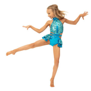 Jazz dancer posed in a forced arch and other leg extended to the side as arms flick outward and they look toward their leg.