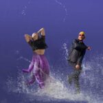 Photoshop composite of Cecaelia woman krumping with man and water splashing