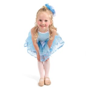 Young dancer posed with feet together and hands on knees.