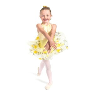 Young dancer posed in b plus with hands crossed in front of them.