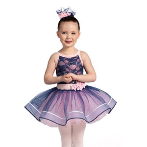 child ballet dance pose in purple tutu