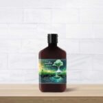 Lotion bottle from Melt on wood table and tile background.