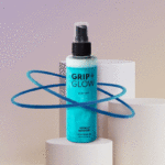 Grip and Glow "GIF glow up" on cylinders with hoops spinning around the product.