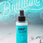 Grip and Glow "GIF glow up" with neon "Be Brilliant" sign behind changing from blue to teal.