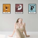 Modern dance posters composited as wall art to show branding in studio.