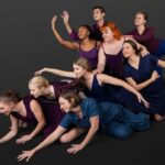 LifeArt Dance company photography of dancers reaching forward into a tiered shape.