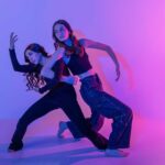 Move by Morelli company dancer shoot, featuring gel lighting with colorful shadows.