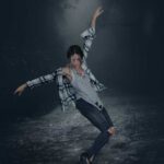 Photo composite of a tap dancer from Rocky Mountain Rhythm posed in a toe stand as the undead in a dark musky forest scene.