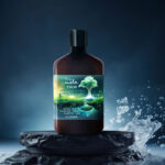 Photo composite of lotion bottle from Melt on a stone with water splashing around in a deep blue scene.