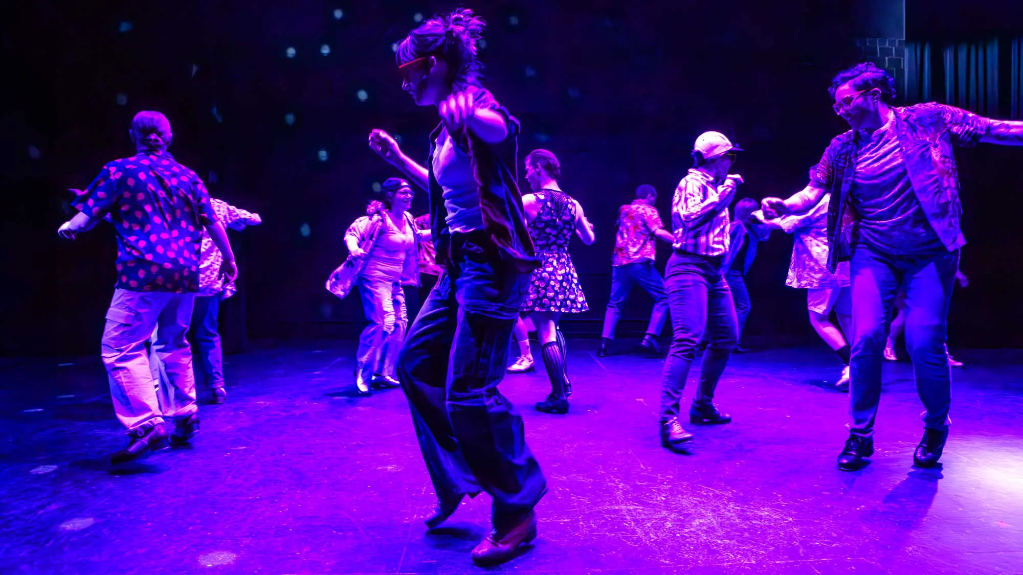 Rocky Mountain Rhythm dancers on stage photographed at dress rehearsal