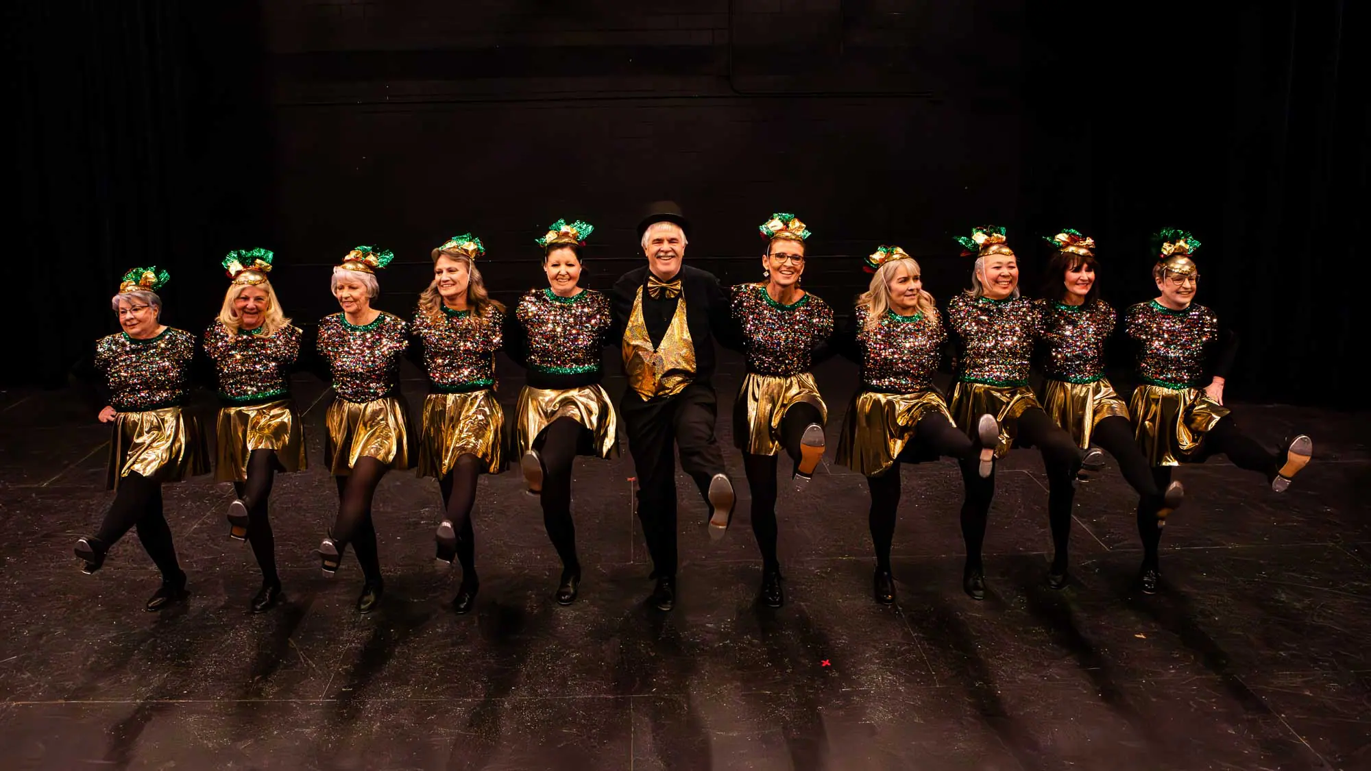 Rockyettes dancers on stage photographed at dress rehearsal