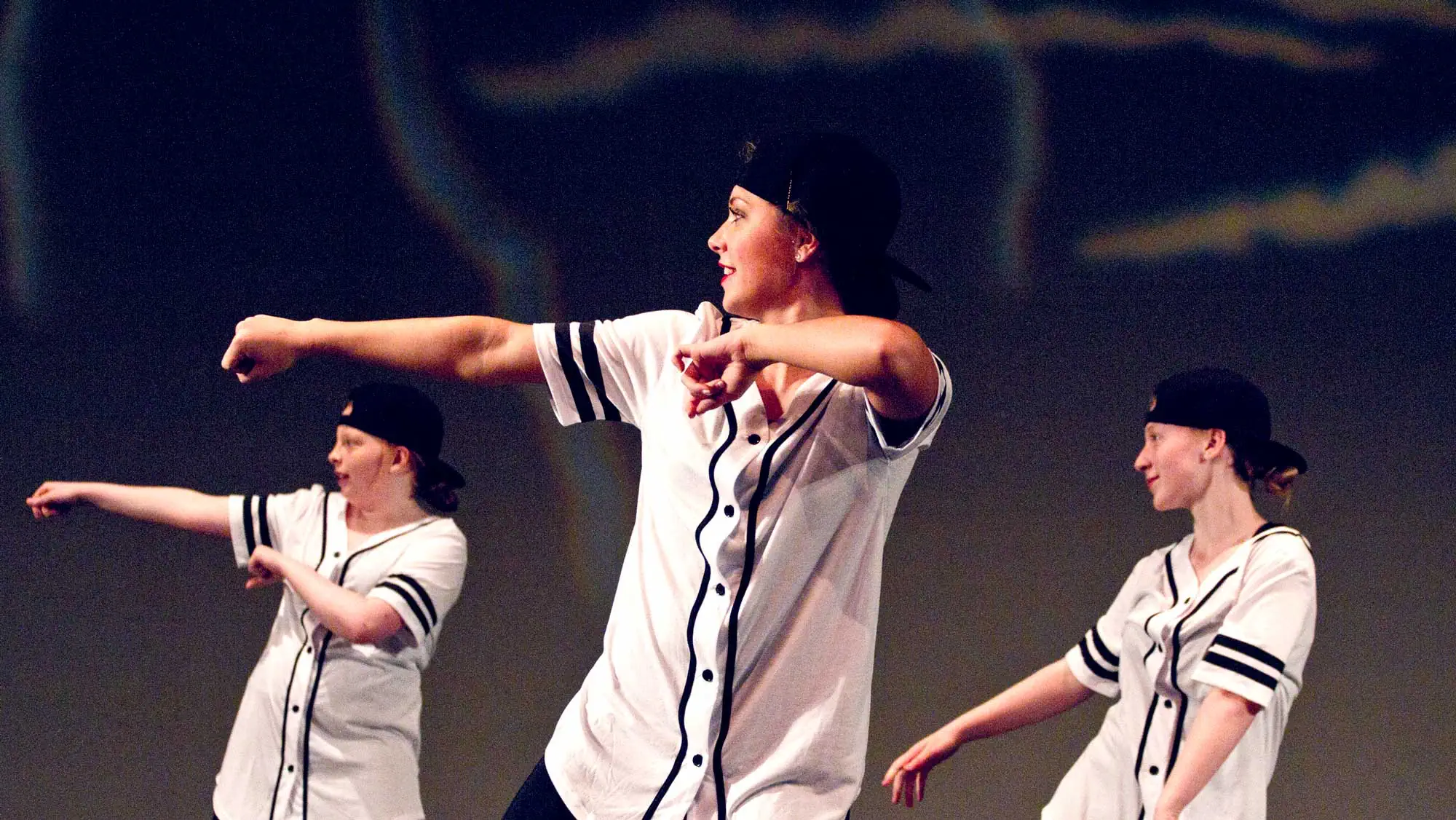 Young dancers on stage photographed at dress rehearsal