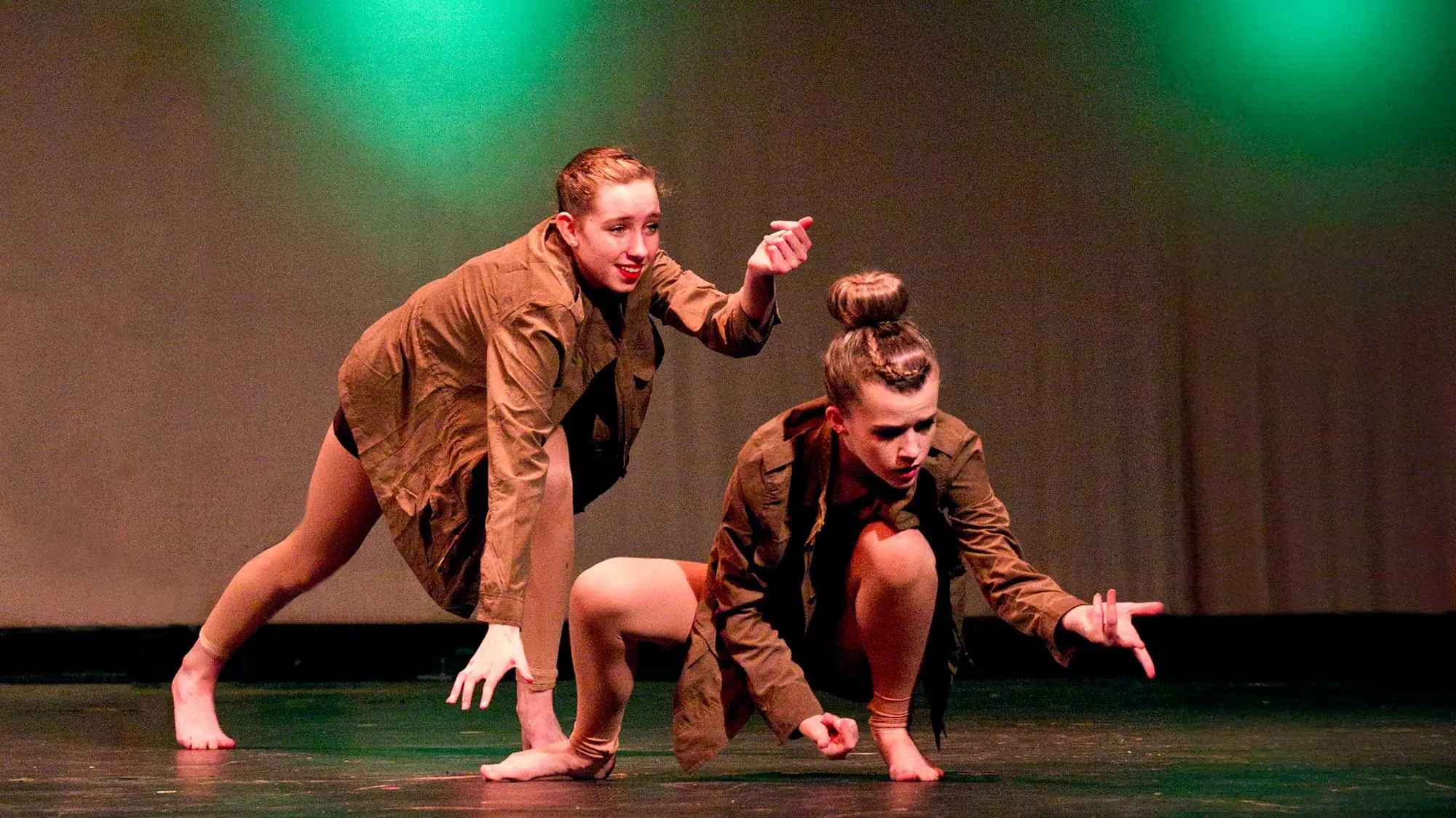 Young dancers on stage photographed at dress rehearsal