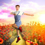 Dancer jumping in a composite featuring a yellow brick roach surrounded by poppies, inspired by the Wizard of Oz