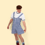 Male dancer in Dorothy-inspired costume showing the detail of the shorts