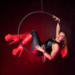 Lyra dancer draped in her hoop