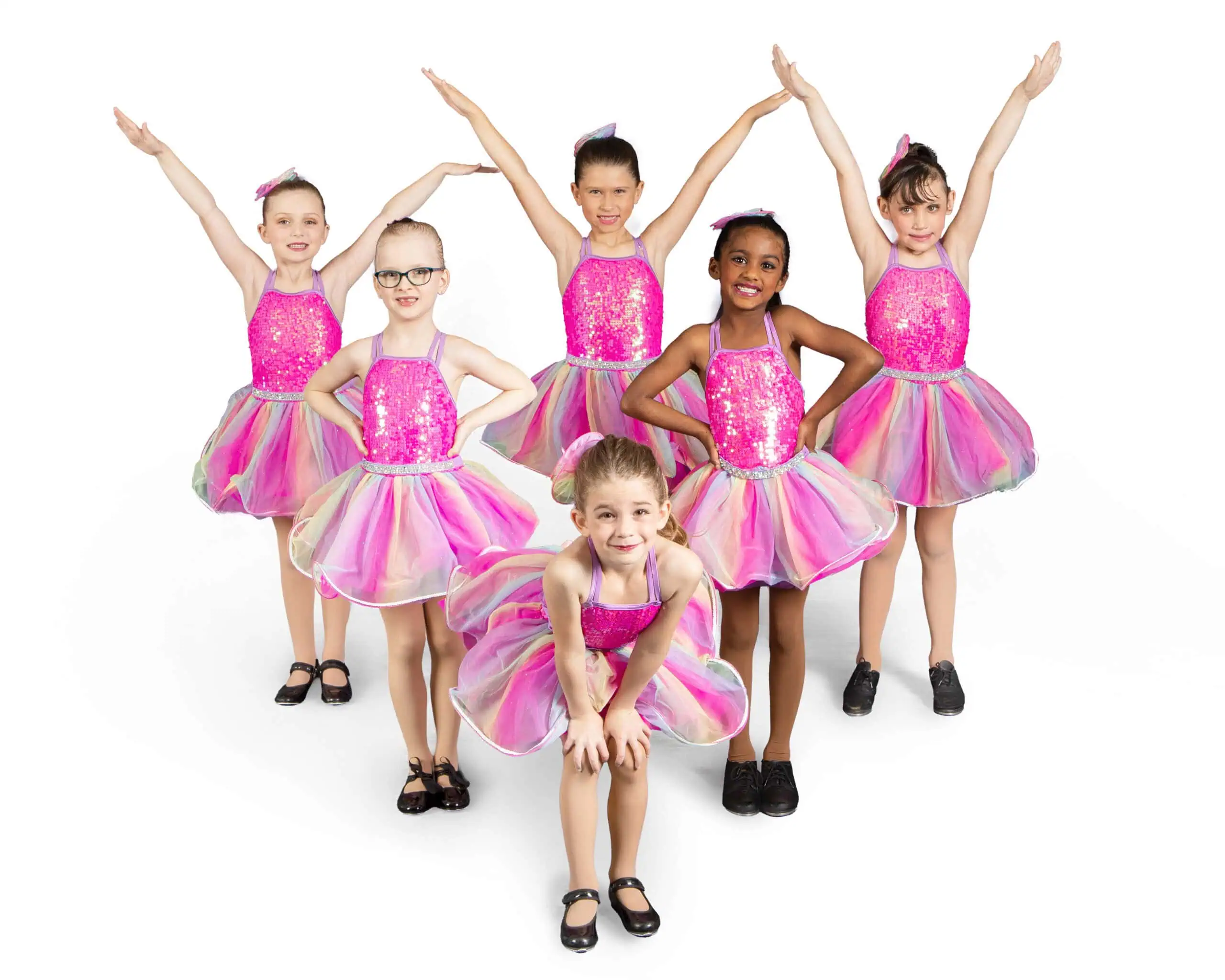 Children in colorful dance costumes.