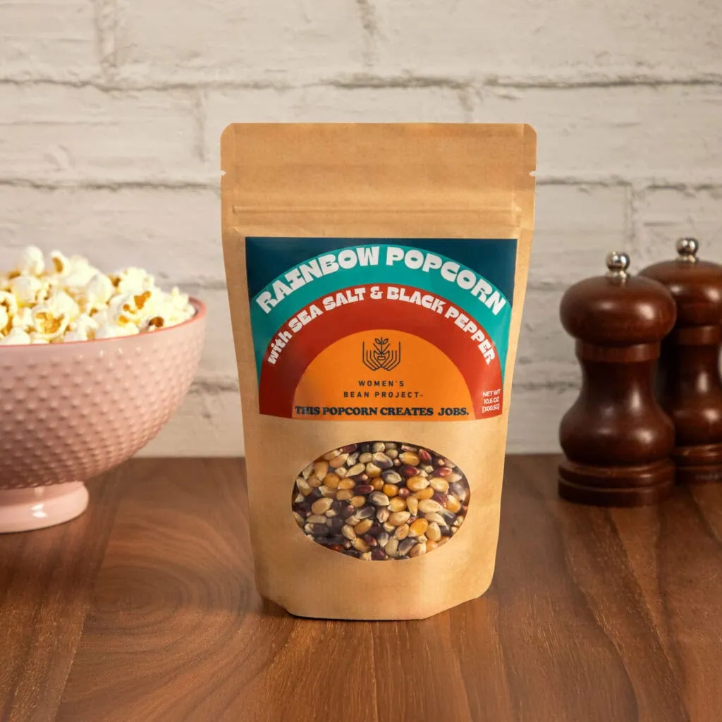 Rainbow popcorn with sea salt and black pepper, created by Women’s Bean Project. Perfect snack for a healthy, flavorful treat.